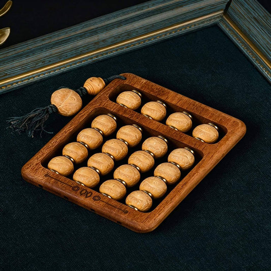 Abacus palm worry stone with bodhi seed beads, brass axle and solid wood frame