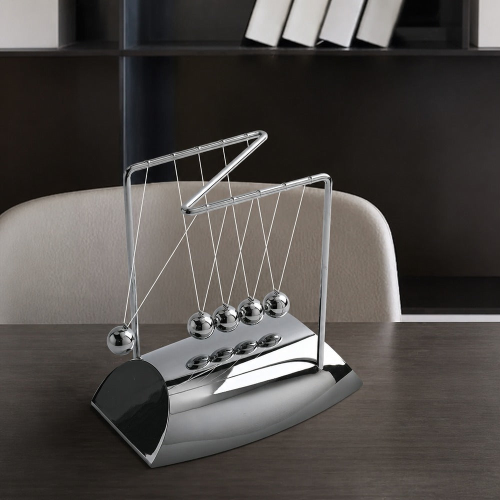Newton's cradle and sand art desk set