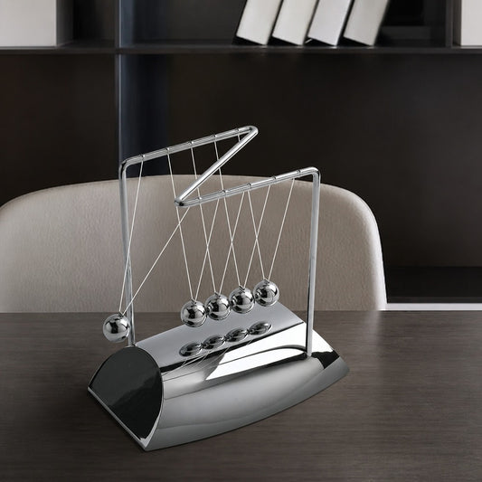 Newton's cradle and sand art desk set