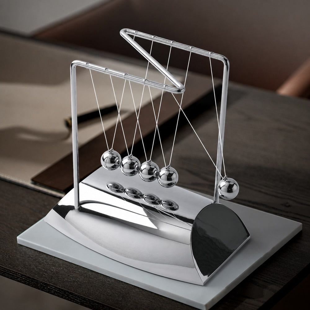 Newton's cradle and sand art desk set