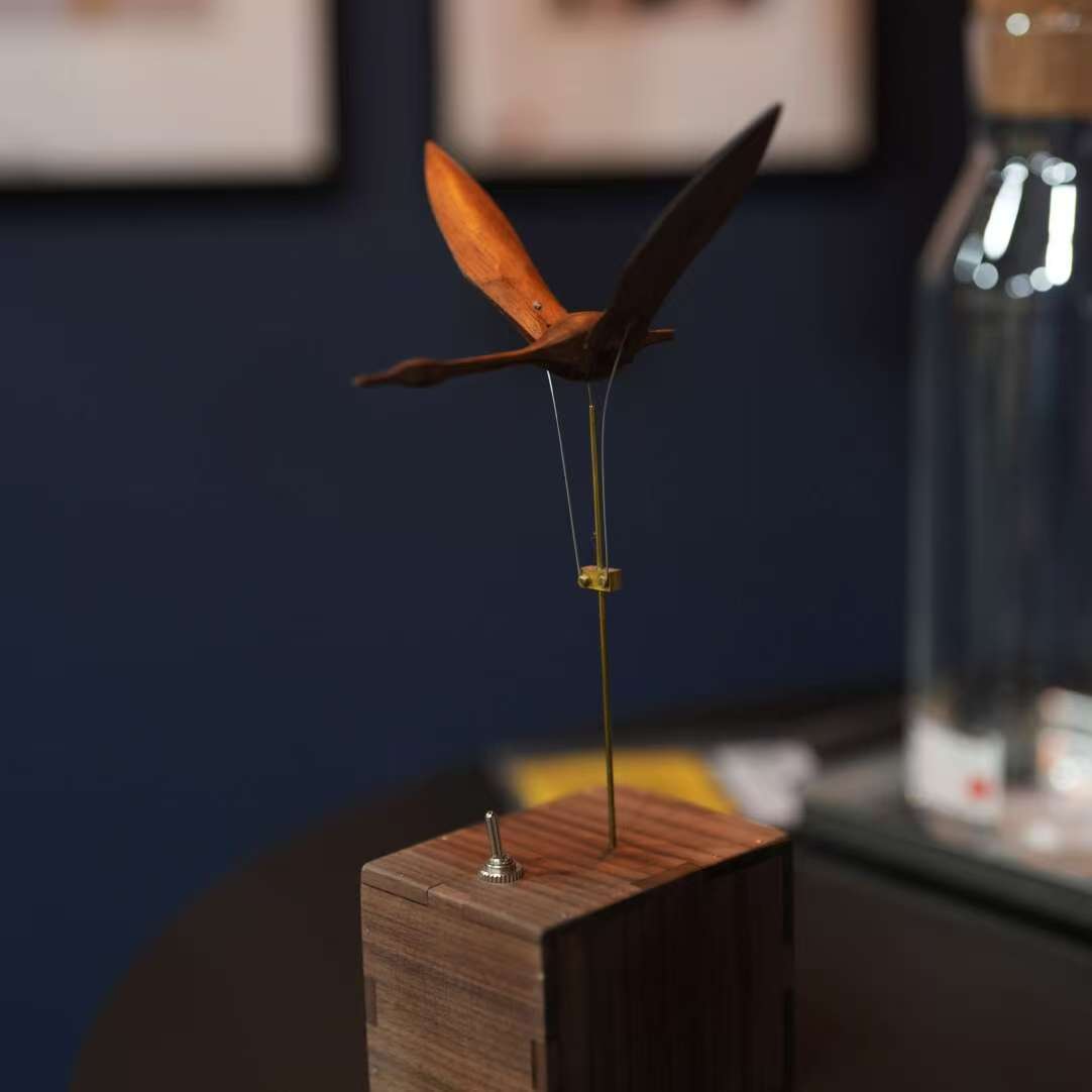 Wood swan kinetic art ornament display