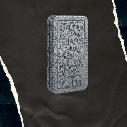 Decorative stone block with skull patterns on a dark textured background