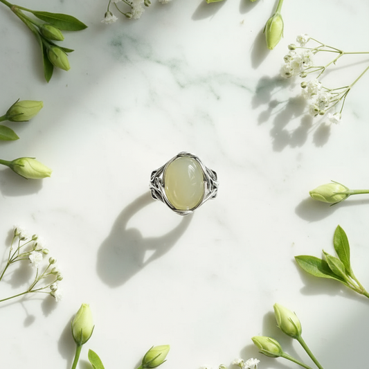 Bud of Hope Ring Botanical Flat Lay