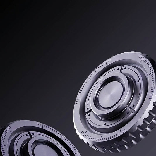 Close-up of a metallic gear on a dark background